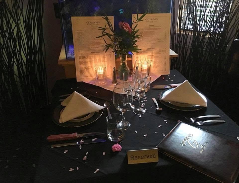 Romantic fine dining table at Giovanni's Italian Steakhouse near High Point NC, perfect for date nights, anniversaries, and authentic Italian dining.