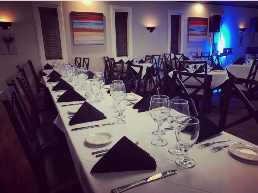 Elegant private dining room at Giovanni's Italian Steakhouse near Jamestown NC, perfect for corporate dinners, birthday parties, family gatherings, and special celebrations.