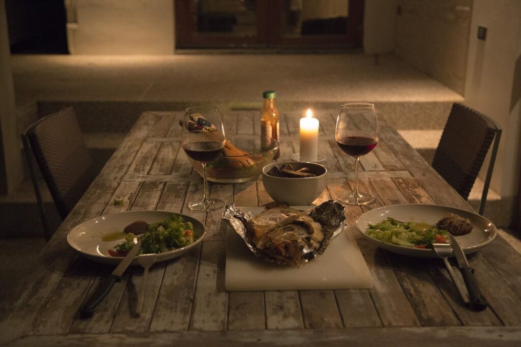 Elegant dinner table with Italian food and wine at Giovanni's in Greensboro NC